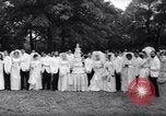 Image of Nine couples marry in Brooklyn's Prospect Park New York City USA, 1967, second 44 stock footage video 65675035699