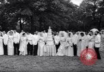 Image of Nine couples marry in Brooklyn's Prospect Park New York City USA, 1967, second 46 stock footage video 65675035699