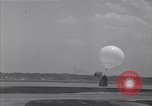Image of Weather balloon being released from Washington National Airport Washington DC USA, 1941, second 36 stock footage video 65675035708
