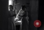 Image of British nurses working blitz field hospitals London England United Kingdom, 1943, second 38 stock footage video 65675035746