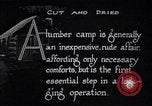Image of Loggers working at camps Northern United States USA, 1920, second 4 stock footage video 65675035756