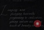 Image of waterfall and wild flowers United States USA, 1920, second 10 stock footage video 65675035759