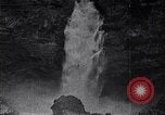 Image of waterfall and wild flowers United States USA, 1920, second 61 stock footage video 65675035759