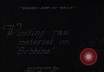 Standbild wicklung der Thread auf Spulen einer Mühle United States USA, 1920, aus Sekunde 22 historischem Filmmaterial Videoclip 65675035760