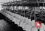 Image of machines and workers manufacturing cloth United States USA, 1920, second 12 stock footage video 65675035761