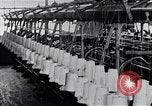 Image of machines and workers manufacturing cloth United States USA, 1920, second 13 stock footage video 65675035761