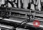 Image of machines and workers manufacturing cloth United States USA, 1920, second 17 stock footage video 65675035761