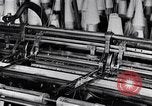 Image of machines and workers manufacturing cloth United States USA, 1920, second 18 stock footage video 65675035761