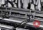 Image of machines and workers manufacturing cloth United States USA, 1920, second 19 stock footage video 65675035761