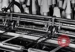 Image of machines and workers manufacturing cloth United States USA, 1920, second 21 stock footage video 65675035761