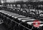 Image of machines and workers manufacturing cloth United States USA, 1920, second 45 stock footage video 65675035761