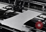 Image of machines and workers manufacturing cloth United States USA, 1920, second 47 stock footage video 65675035761