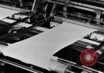 Image of machines and workers manufacturing cloth United States USA, 1920, second 48 stock footage video 65675035761