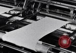Image of machines and workers manufacturing cloth United States USA, 1920, second 49 stock footage video 65675035761