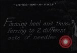 Image of machines and workers manufacturing cloth United States USA, 1920, second 52 stock footage video 65675035761