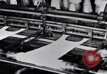Image of machines and workers manufacturing cloth United States USA, 1920, second 62 stock footage video 65675035761