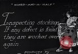 Image of error checking in produced stockings United States USA, 1920, second 4 stock footage video 65675035762