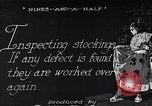 Image of error checking in produced stockings United States USA, 1920, second 7 stock footage video 65675035762