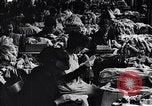 Image of error checking in produced stockings United States USA, 1920, second 10 stock footage video 65675035762