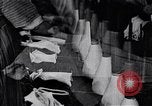 Image of error checking in produced stockings United States USA, 1920, second 17 stock footage video 65675035762