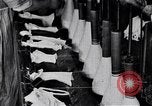 Image of error checking in produced stockings United States USA, 1920, second 18 stock footage video 65675035762