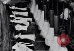 Image of error checking in produced stockings United States USA, 1920, second 19 stock footage video 65675035762