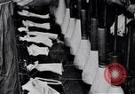 Image of error checking in produced stockings United States USA, 1920, second 23 stock footage video 65675035762