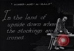 Image of error checking in produced stockings United States USA, 1920, second 28 stock footage video 65675035762