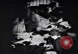 Image of error checking in produced stockings United States USA, 1920, second 46 stock footage video 65675035762
