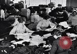 Image of error checking in produced stockings United States USA, 1920, second 47 stock footage video 65675035762