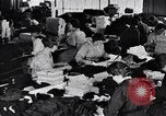 Image of error checking in produced stockings United States USA, 1920, second 50 stock footage video 65675035762