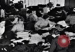 Image of error checking in produced stockings United States USA, 1920, second 51 stock footage video 65675035762
