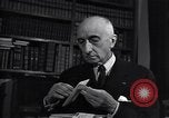 Image of old men in a library United States USA, 1951, second 7 stock footage video 65675035797