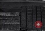 Image of old men in a library United States USA, 1951, second 10 stock footage video 65675035797