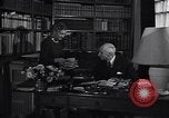 Image of old men in a library United States USA, 1951, second 15 stock footage video 65675035797