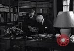 Image of old men in a library United States USA, 1951, second 16 stock footage video 65675035797