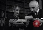 Image of old men in a library United States USA, 1951, second 24 stock footage video 65675035797