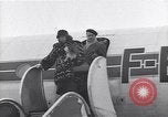 Image of Famous woman descends from a plane United States USA, 1951, second 32 stock footage video 65675035805