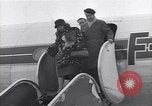 Image of Famous woman descends from a plane United States USA, 1951, second 33 stock footage video 65675035805