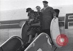 Image of Famous woman descends from a plane United States USA, 1951, second 34 stock footage video 65675035805
