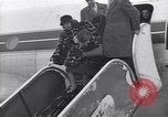 Image of Famous woman descends from a plane United States USA, 1951, second 37 stock footage video 65675035805