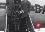 Image of Famous woman descends from a plane United States USA, 1951, second 40 stock footage video 65675035805