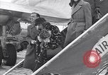 Image of Famous woman descends from a plane United States USA, 1951, second 43 stock footage video 65675035805