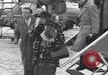 Image of Famous woman descends from a plane United States USA, 1951, second 46 stock footage video 65675035805