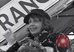 Image of Famous woman descends from a plane United States USA, 1951, second 55 stock footage video 65675035805