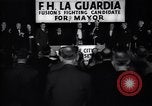Immagine di Benvenuto di F H LaGuardia presso la sua campagna elettorale New York United States USA, 1934, secondo 43 filmato di repertorio 65675035822