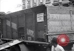 Image of African American driver unloading coal New York United States USA, 1939, second 5 stock footage video 65675035836
