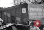 Image of African American driver unloading coal New York United States USA, 1939, second 8 stock footage video 65675035836