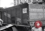 Image of African American driver unloading coal New York United States USA, 1939, second 9 stock footage video 65675035836