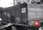 Image of African American driver unloading coal New York United States USA, 1939, second 10 stock footage video 65675035836